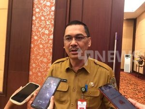 Kadiskominfo saat ditemuai awak media